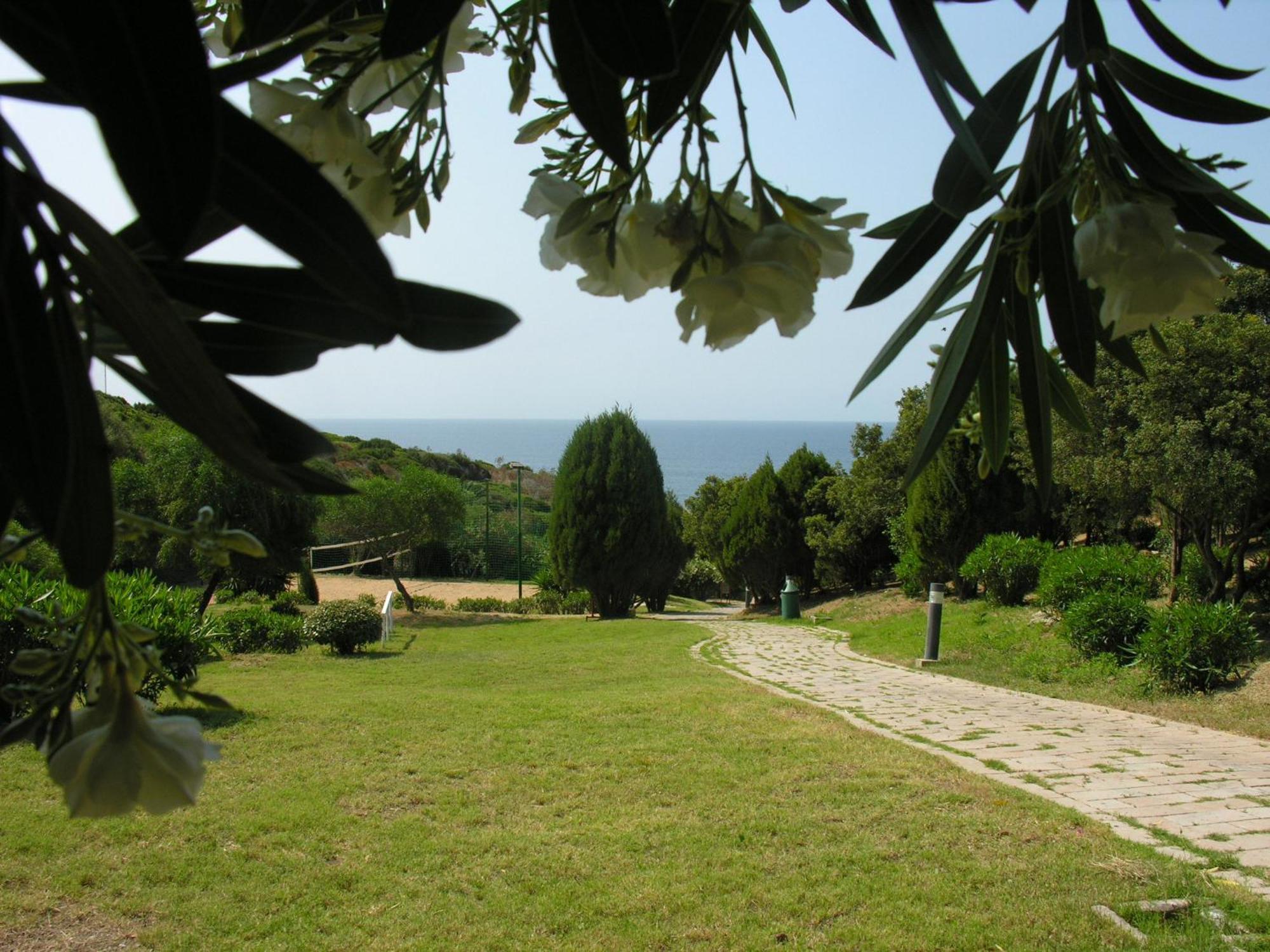 Eco Village Baia Delle Ginestre Теулада Экстерьер фото